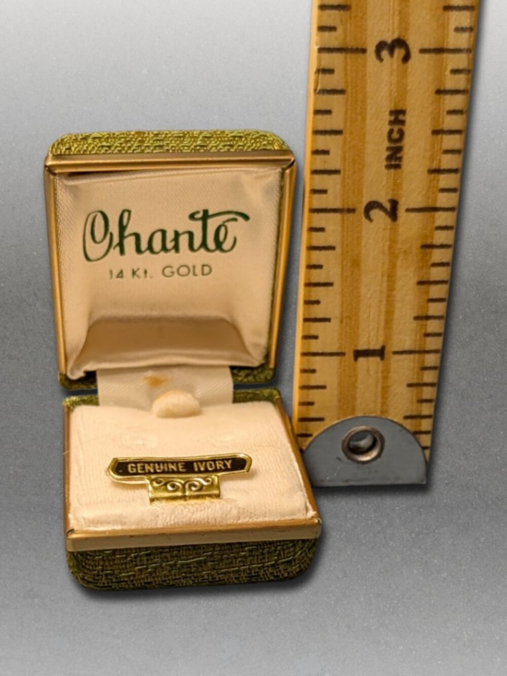 Avocado Green vintage Chante Earring box with "genuine ivory" tag inside